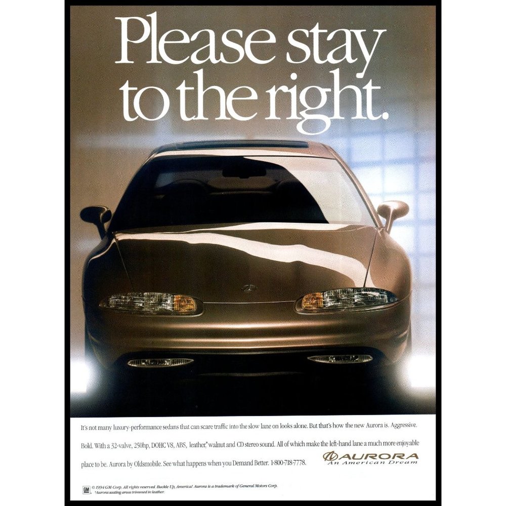 1995 Oldsmobile Aurora Sedan Vintage Print Ad Showroom Stay the Night Wall Art